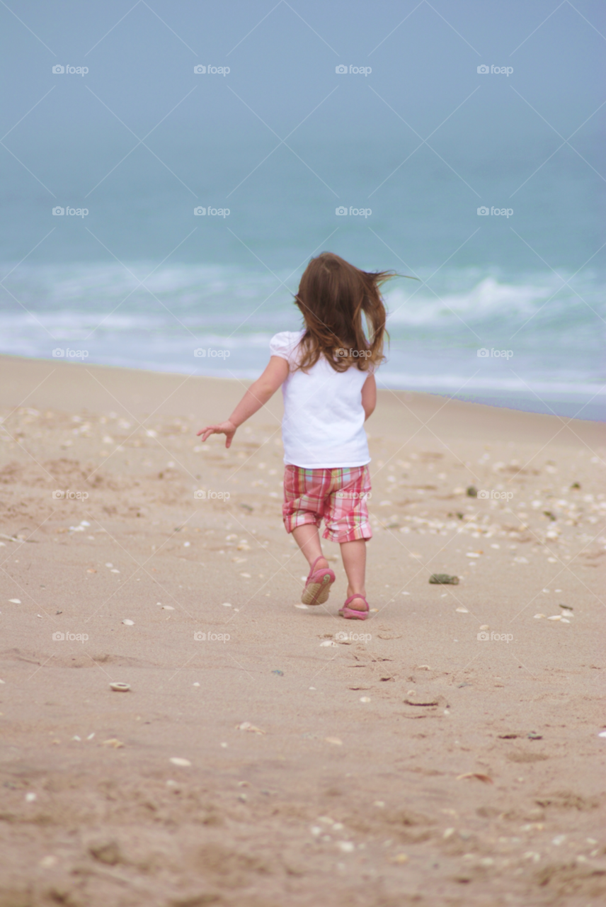 florida play child running on beach girl running by sher4492000