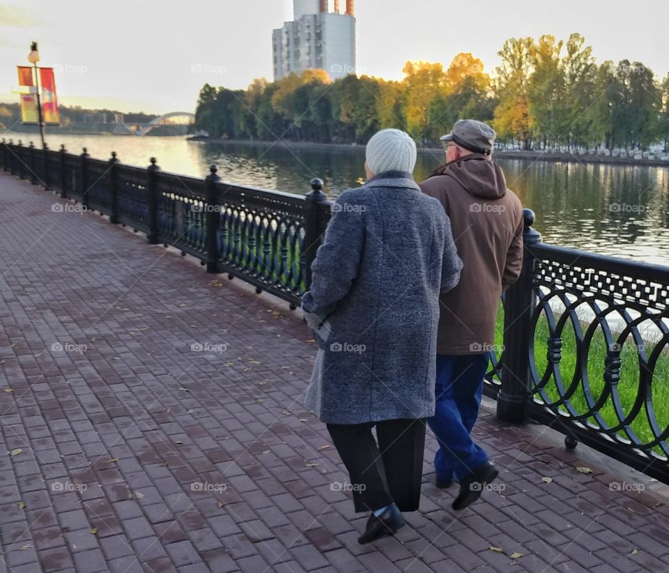 This couple i saw in a park. They were walking and talking ti each other. I don't know what about but it's nice to find a subject for a conversation.