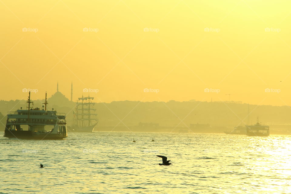 bosphorus at golden hour. watching sunset in uskadar istanbul