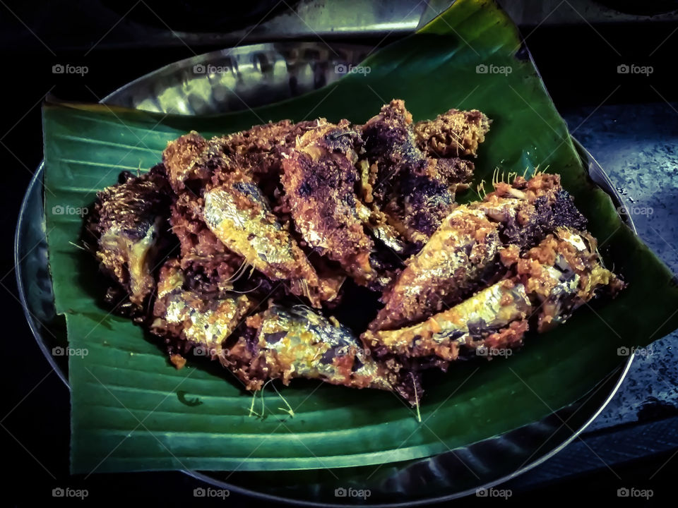 south Indian fish fry on banana leaf