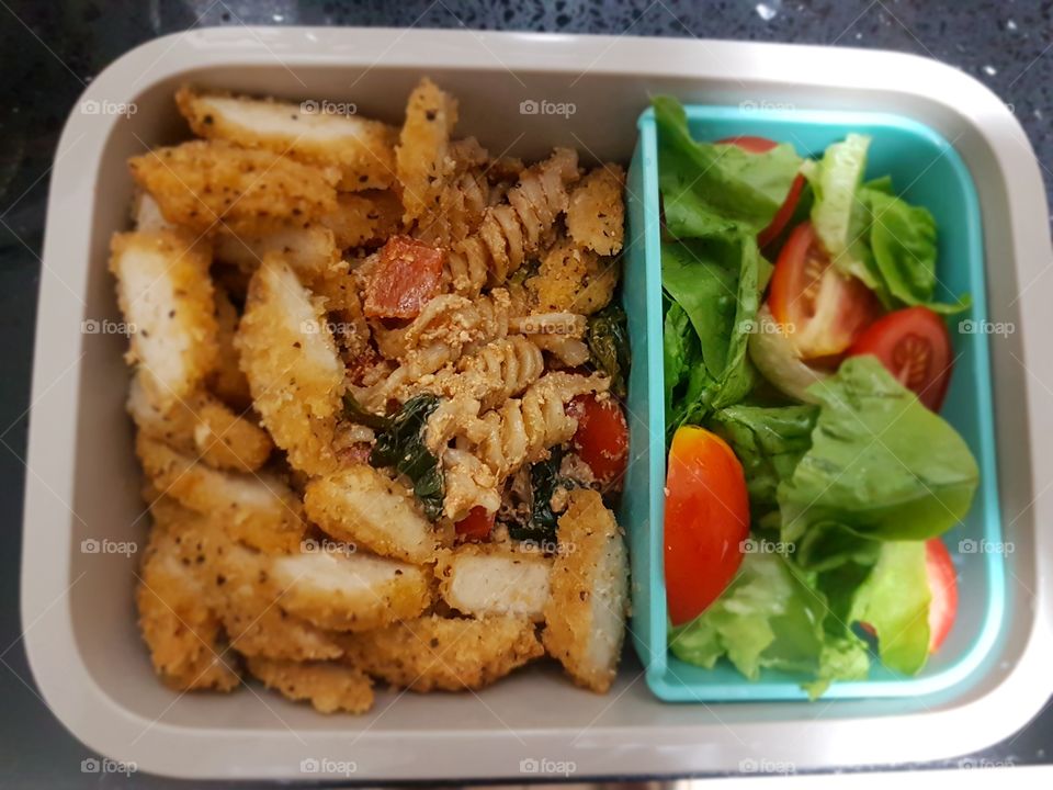 Sicilian pesto pasta with soy nuggets and side salad