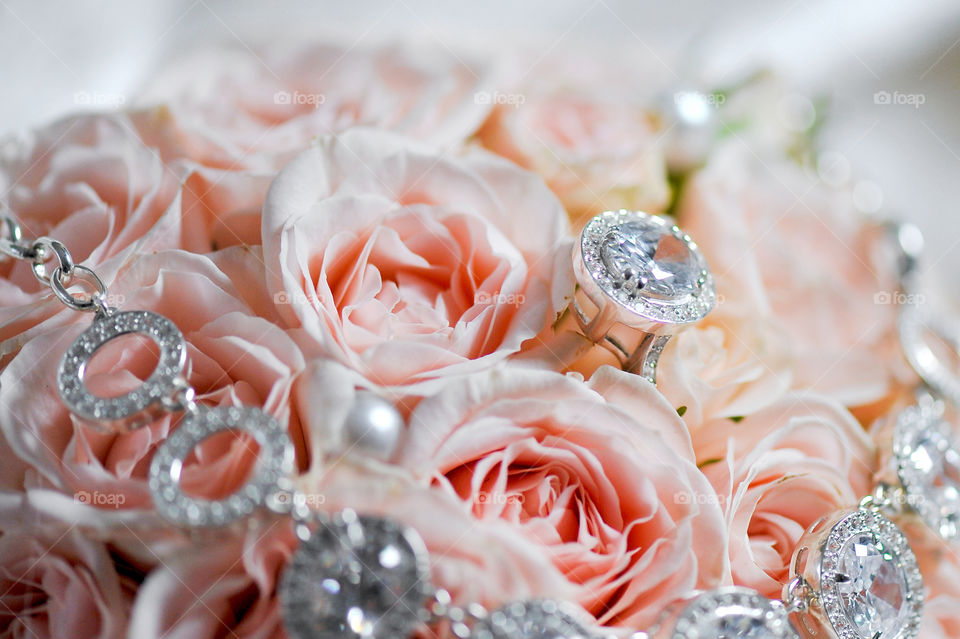 jewelry on a bouquet of roses
