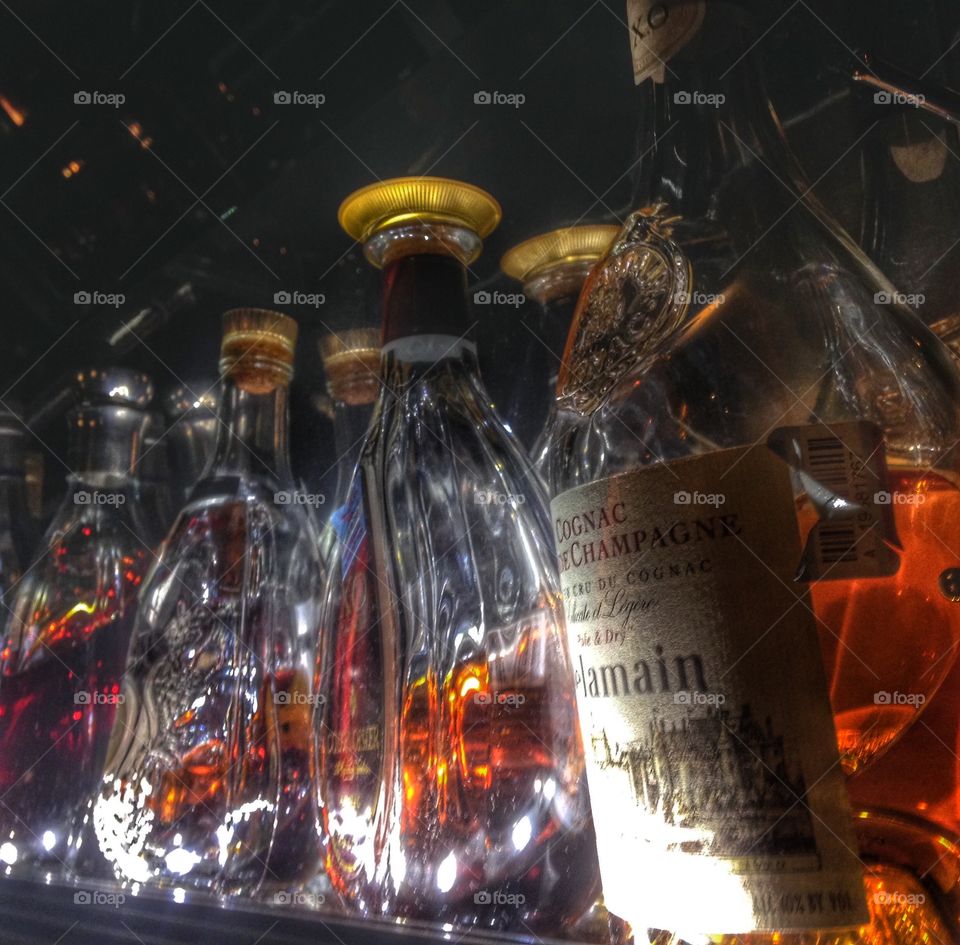 Night life. Liquor bottles at a bar