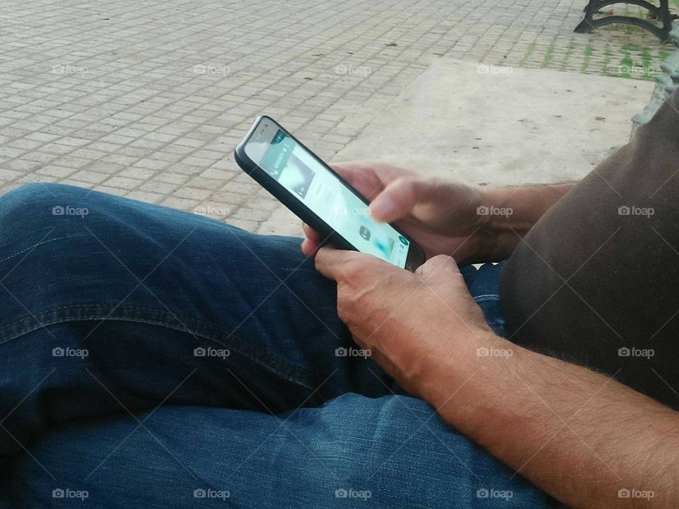 A man using its phone