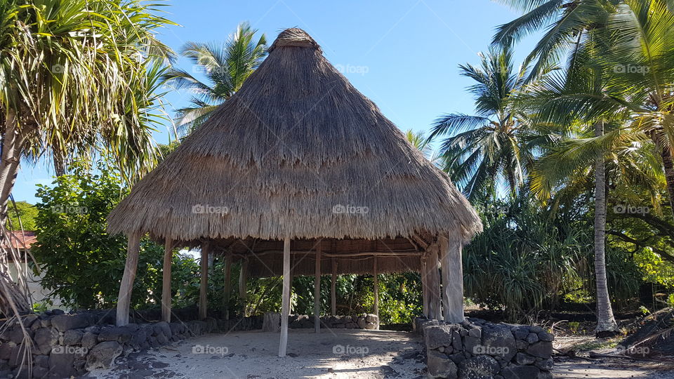 Traditional Hawaiian house in the Pu'uhonua O Hōnaunau National Historical Park, Big Island, Hawai'i, USA