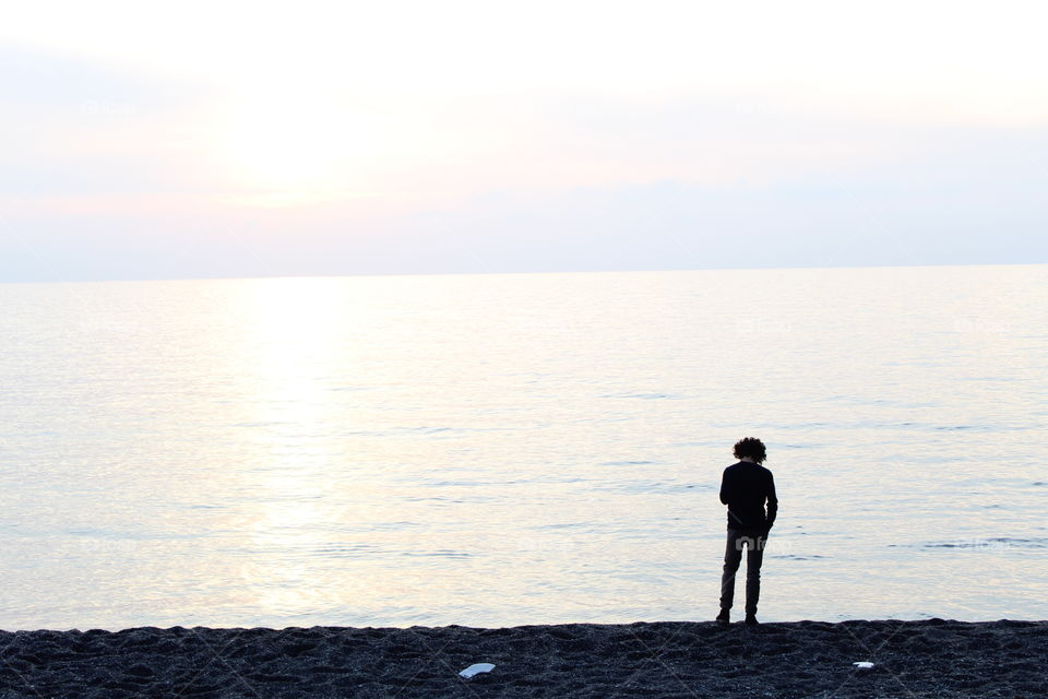 solitary man at the beach
