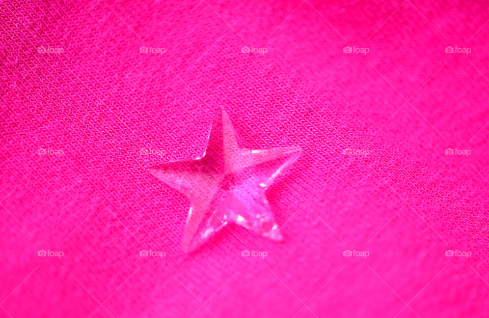 Crystal star on pink background