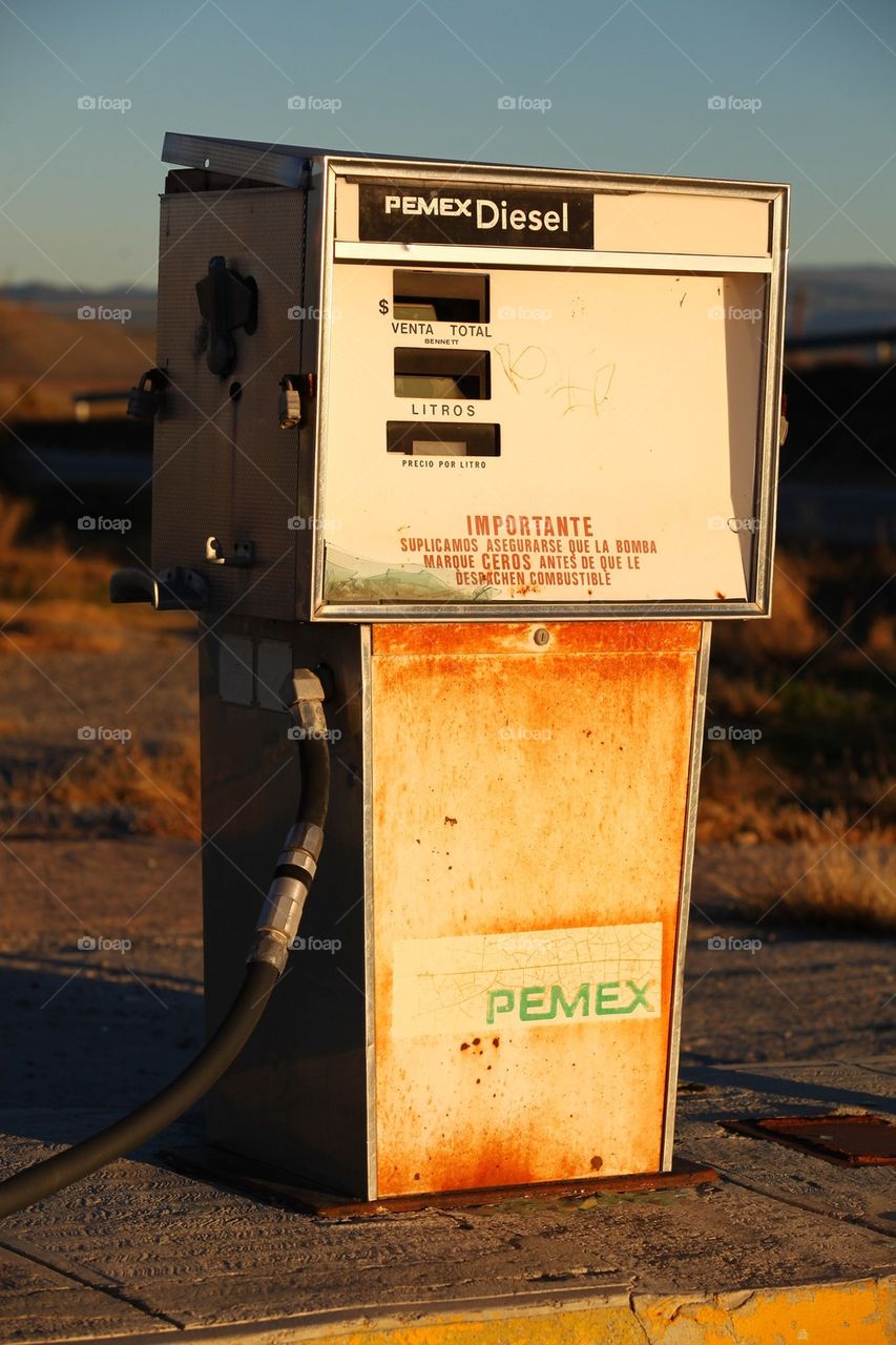 Old gas pump at abandoned gas station