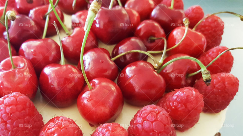 Close-up of raspberry cherry cake