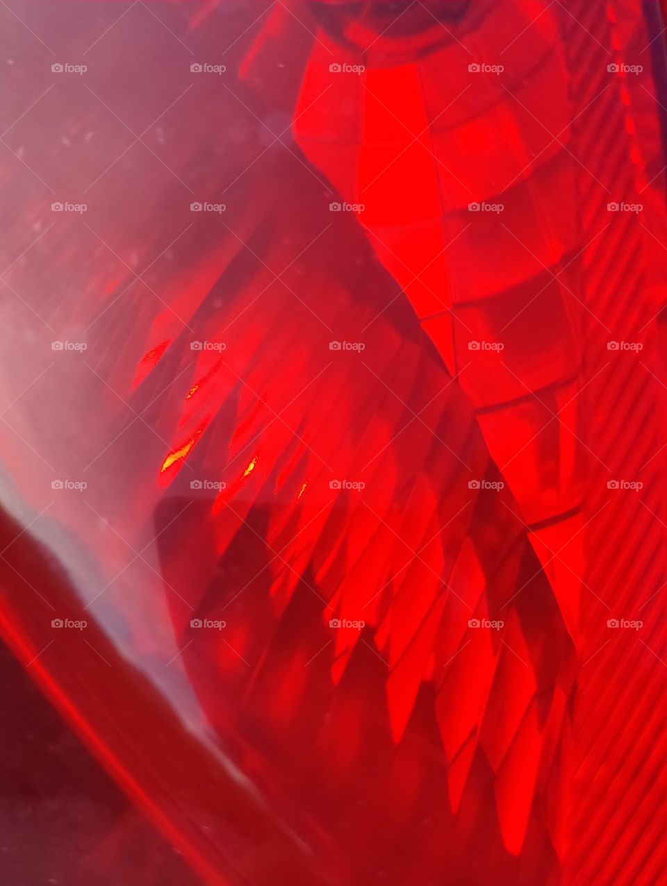 Detail of a red back light of a car from 2008