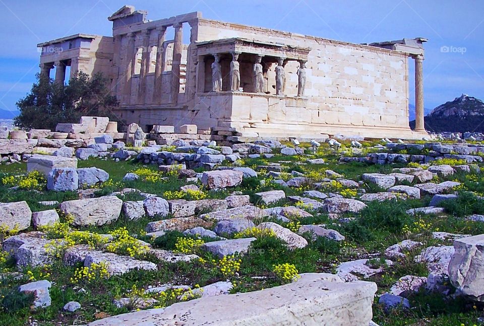 Athens, Greece: Acropolis, Porch of the Maidens (Caryatids), with Mt. Lycabettus in the background 