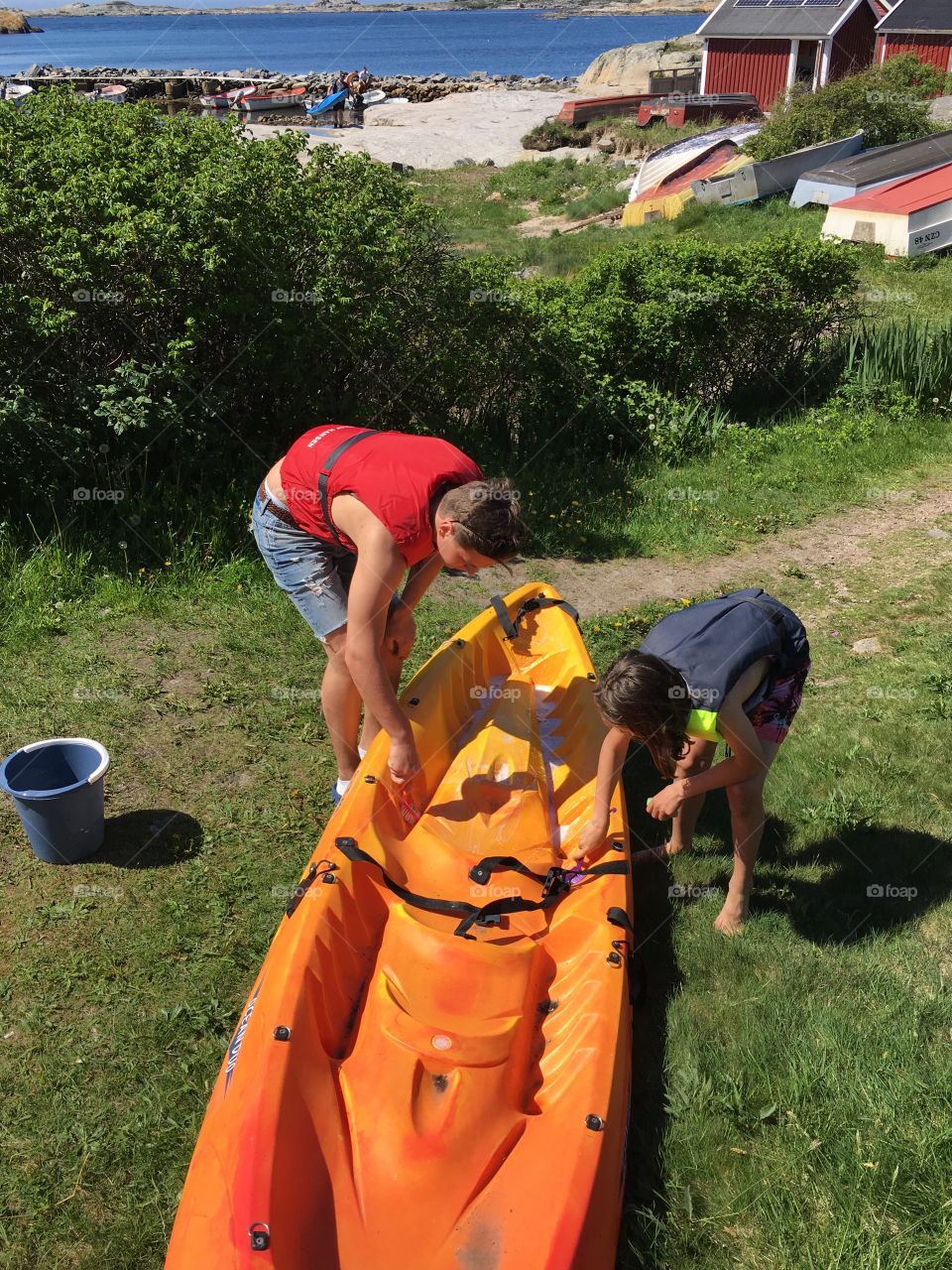 Cleaning the canoe for the season