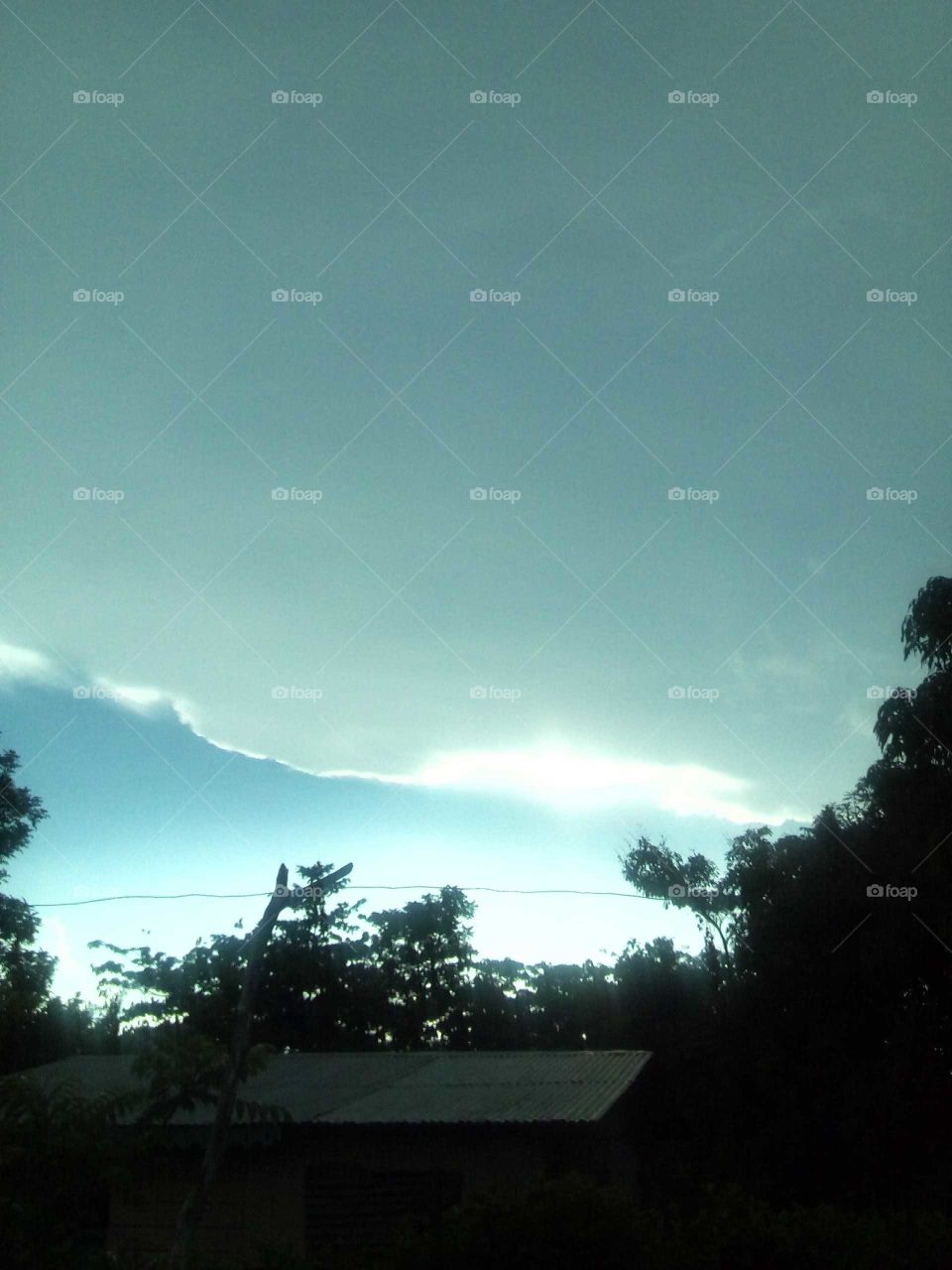 the evening is coming down and I see this great shape in the sky an I have to take this picture.