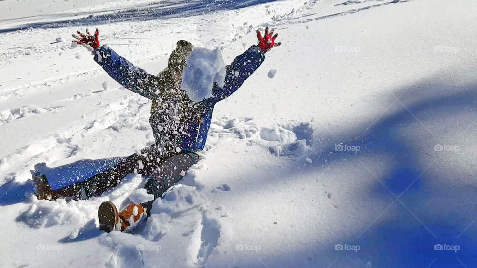 snow angel, snow fight, throwing snow, girl enjoying the snow