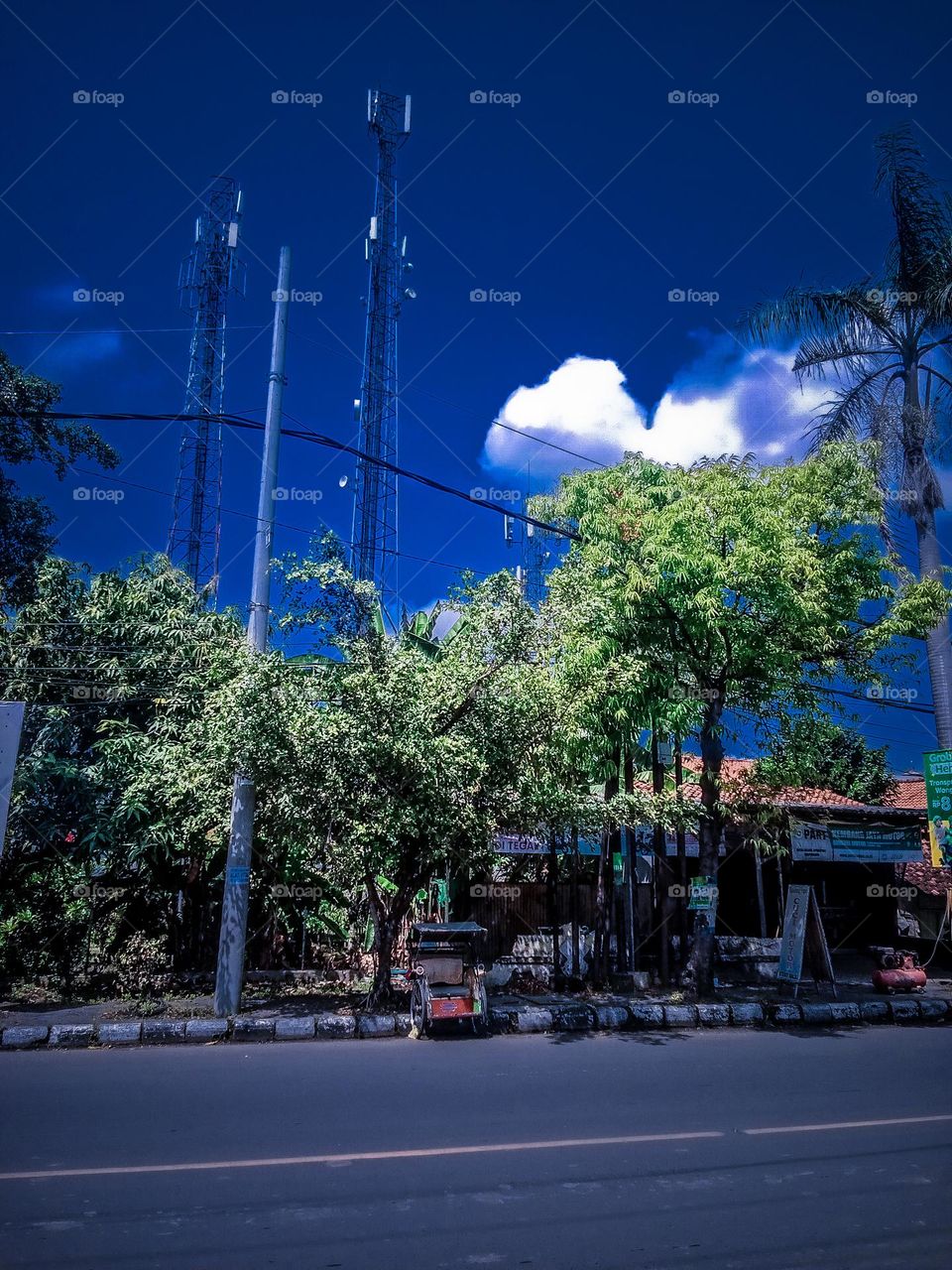 a view of the blue sky with thick clouds