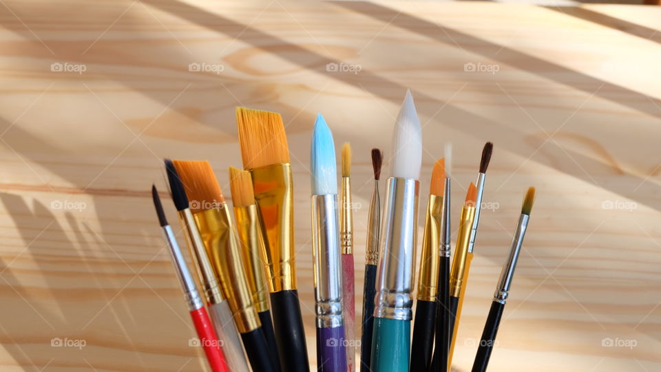 Variety of paintbrushes on table