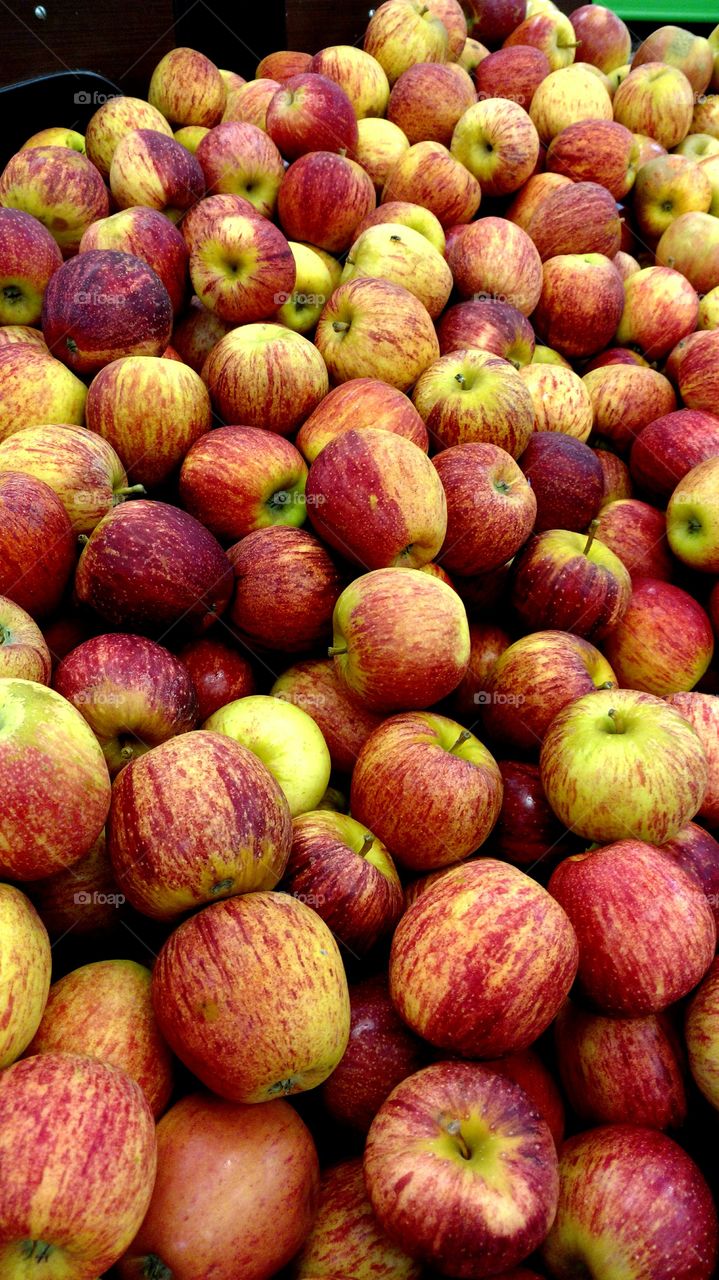 Heap of apples for sale at market