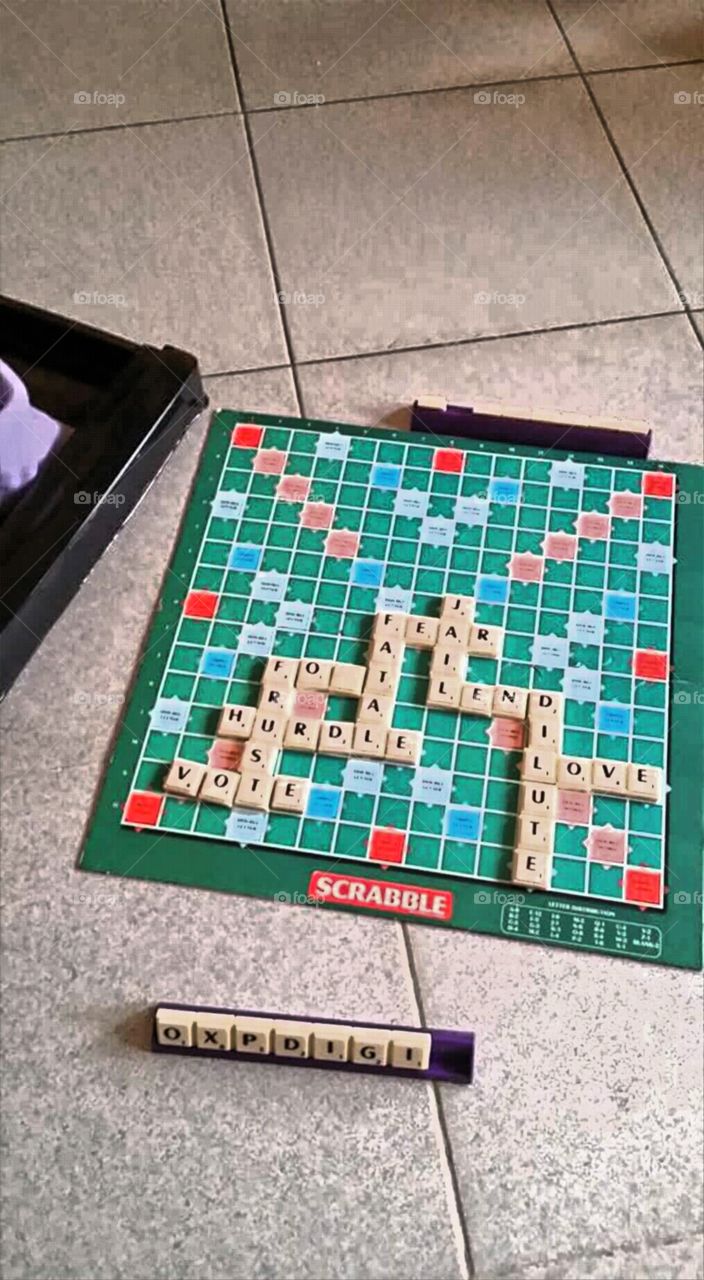 A short game of Scrabble won't hurt anyone I guess.