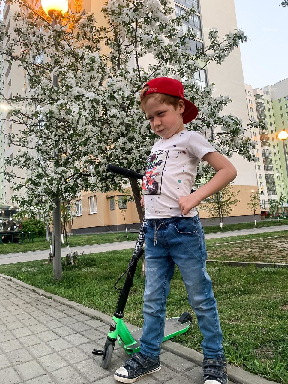 Child red-haired boy, bright emotions anger