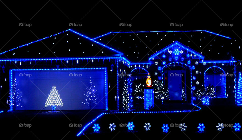 True Blue lighted residence!
Beautiful magical blue Christmas lights outline this residence where a competition goes on!