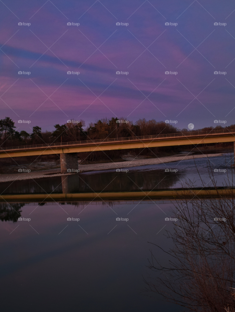 sunset bridges reflection on water