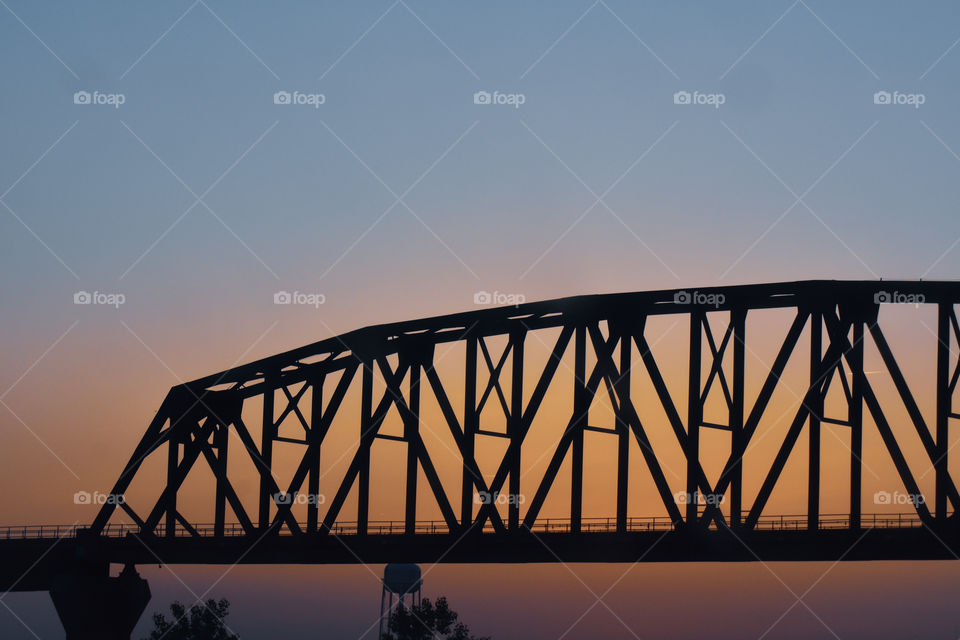 bridge in front of a sunset in South Dakota