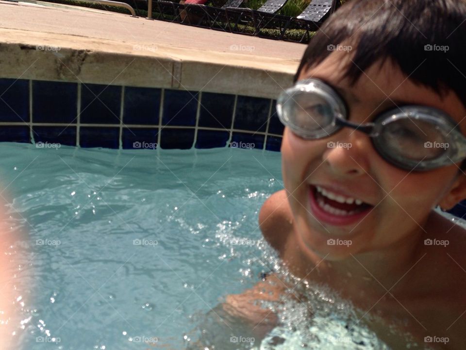 Laughing pool boy