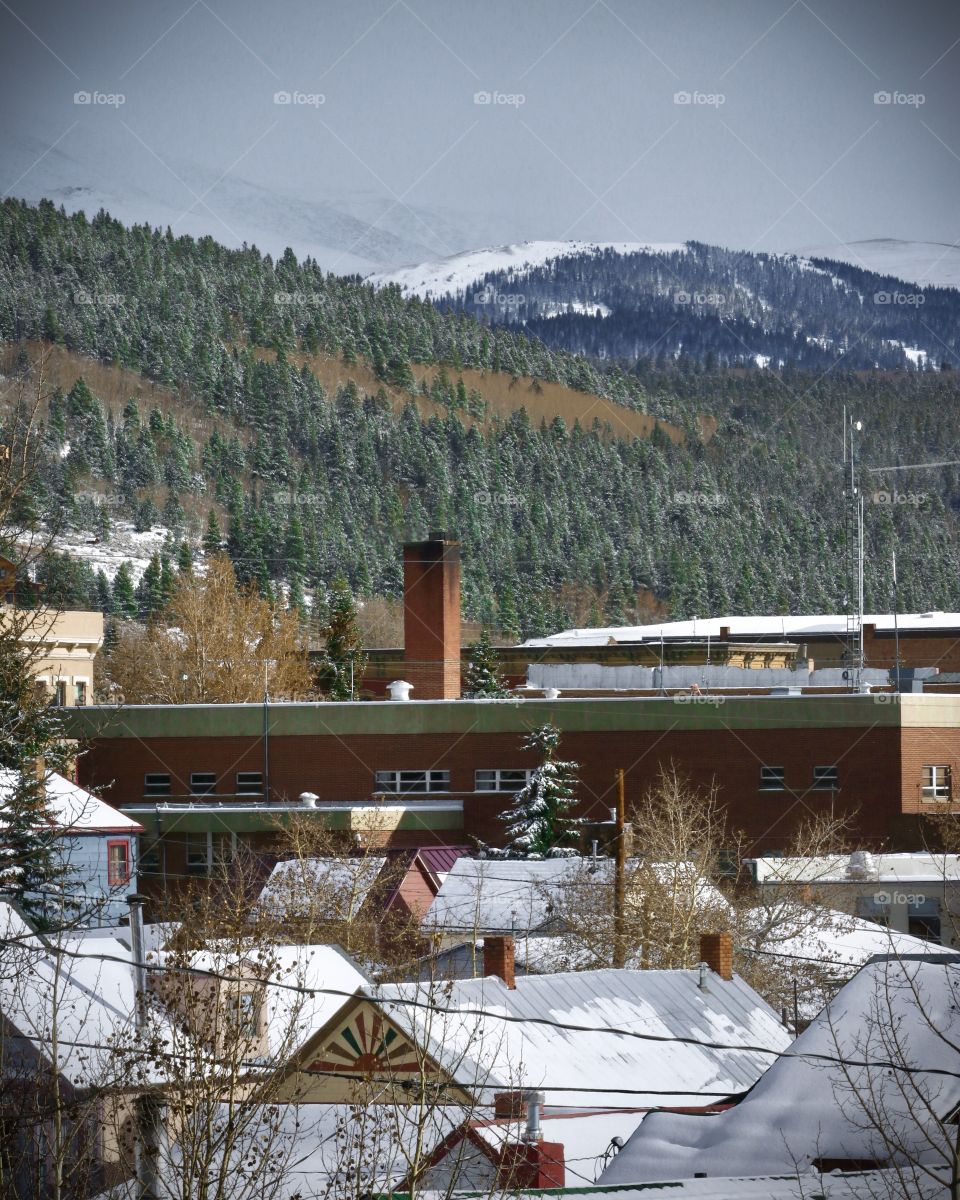 Small town in the mountains of Colorado covered in snow.
