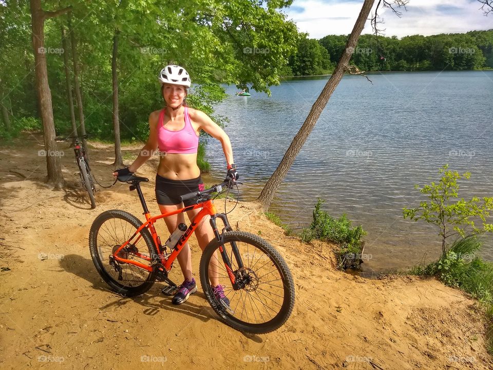 girl with bike in beach