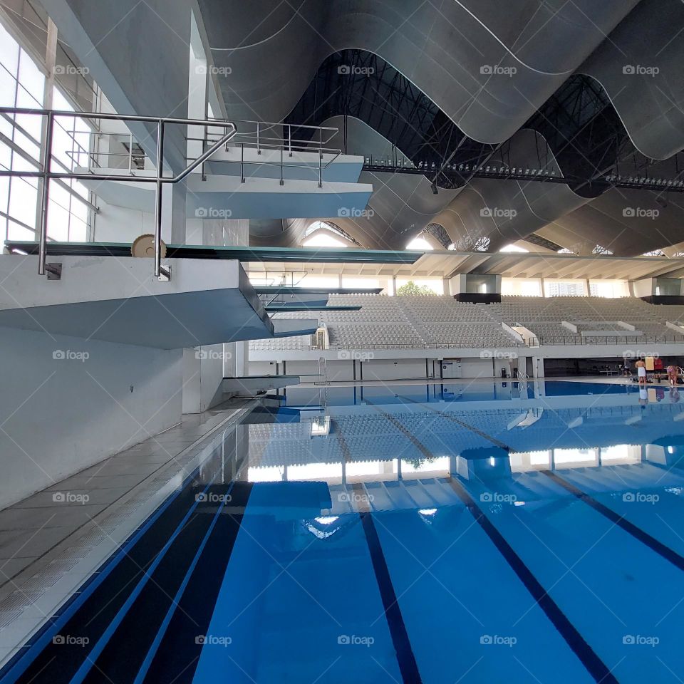 the pool area has been prepared for the swimming competition.  The swimming track has been installed in the pool and the championship is ready to start