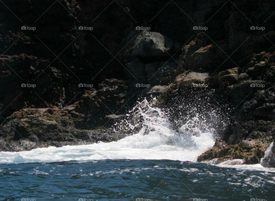 Water Against The Rocks