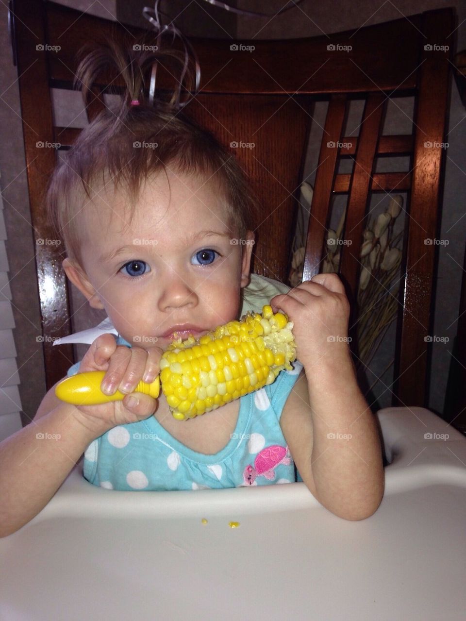 Baby Eating Corn