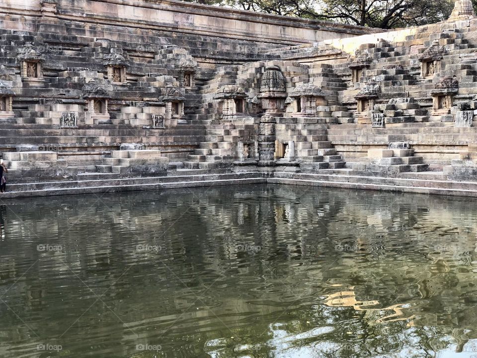 Stepwell architects with a reflection