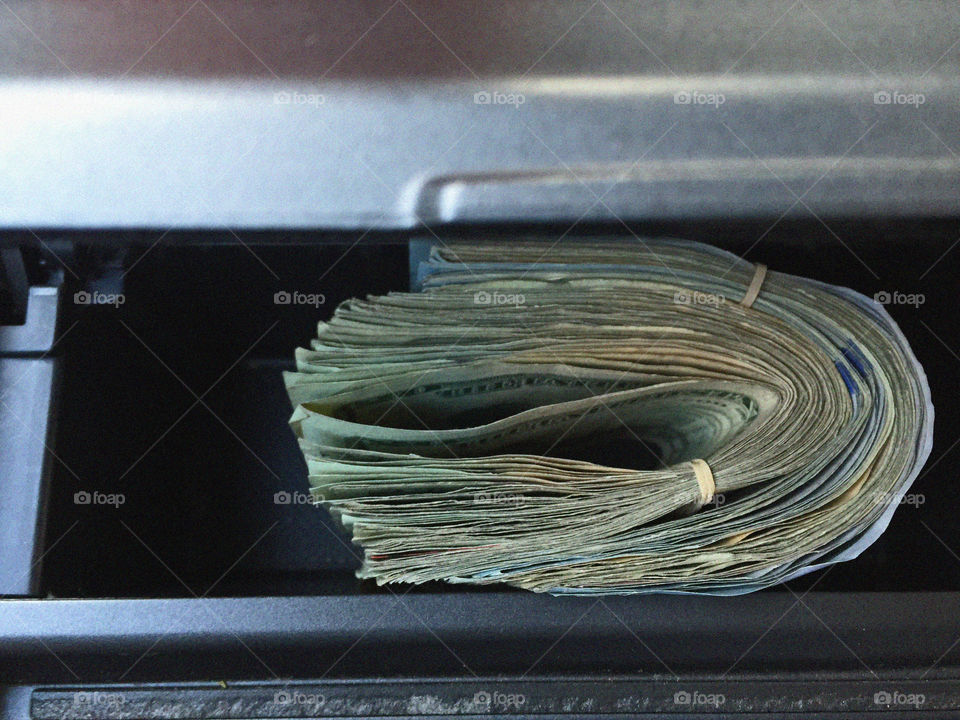 2 Bands. Cash rubber banded and tucked into a small compartment of a car.  Stay organized my friends.