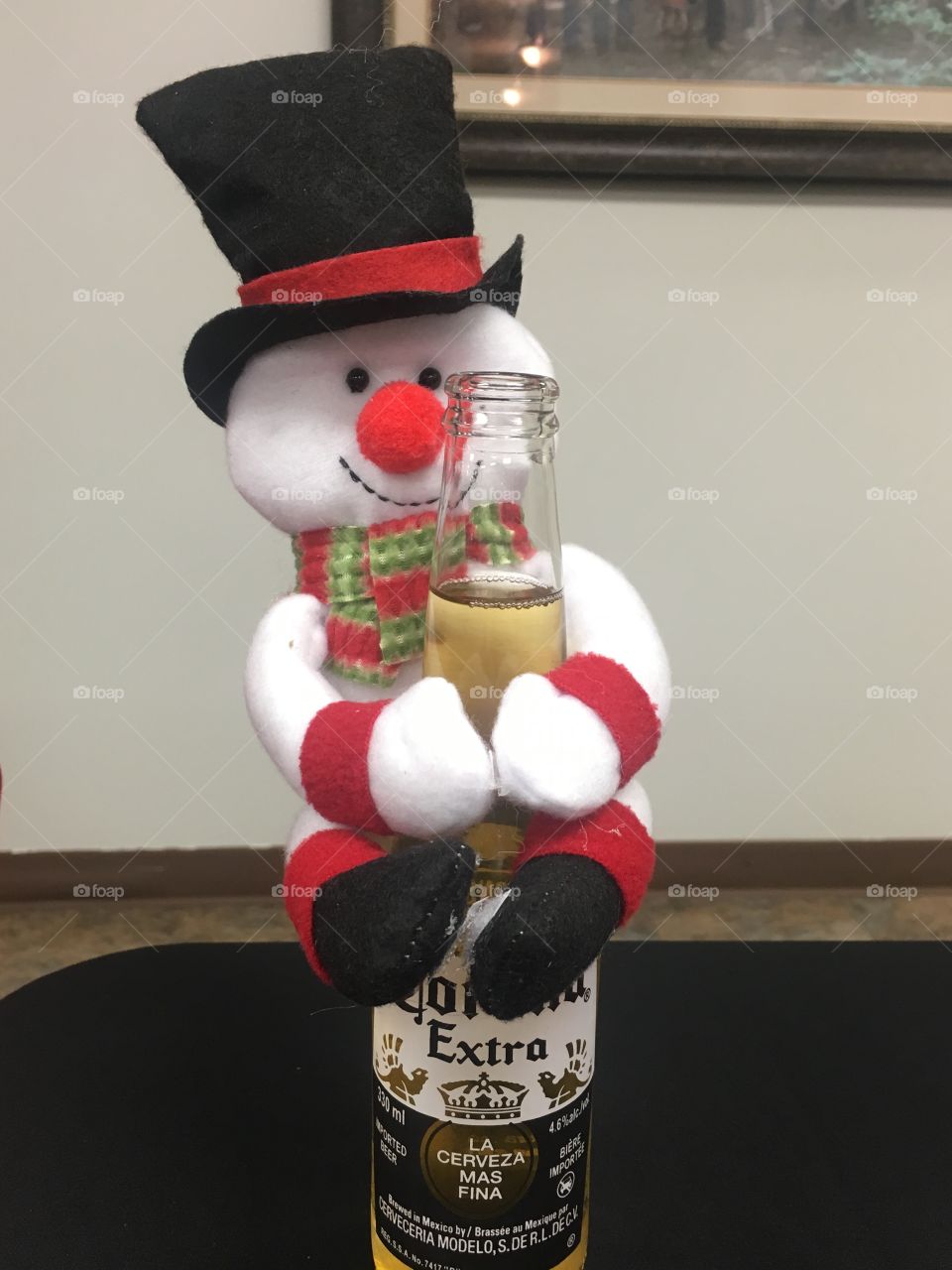 Frosty the snowman with his corona 
