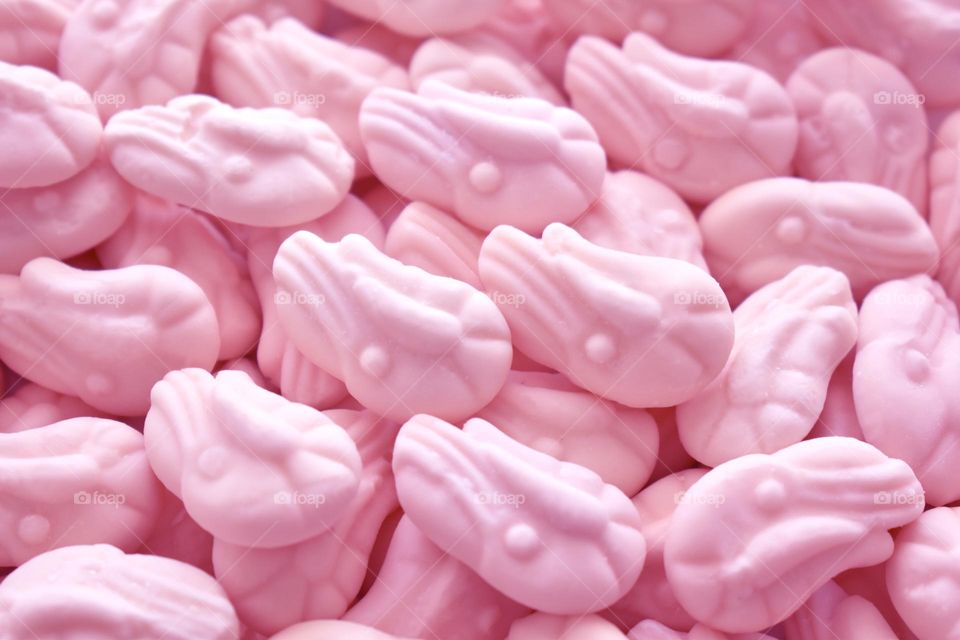 Pink shrimp sweet candy background.