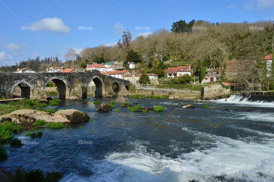 Medieval bridge over river Tambre at Ponte Maceira, Galicia.