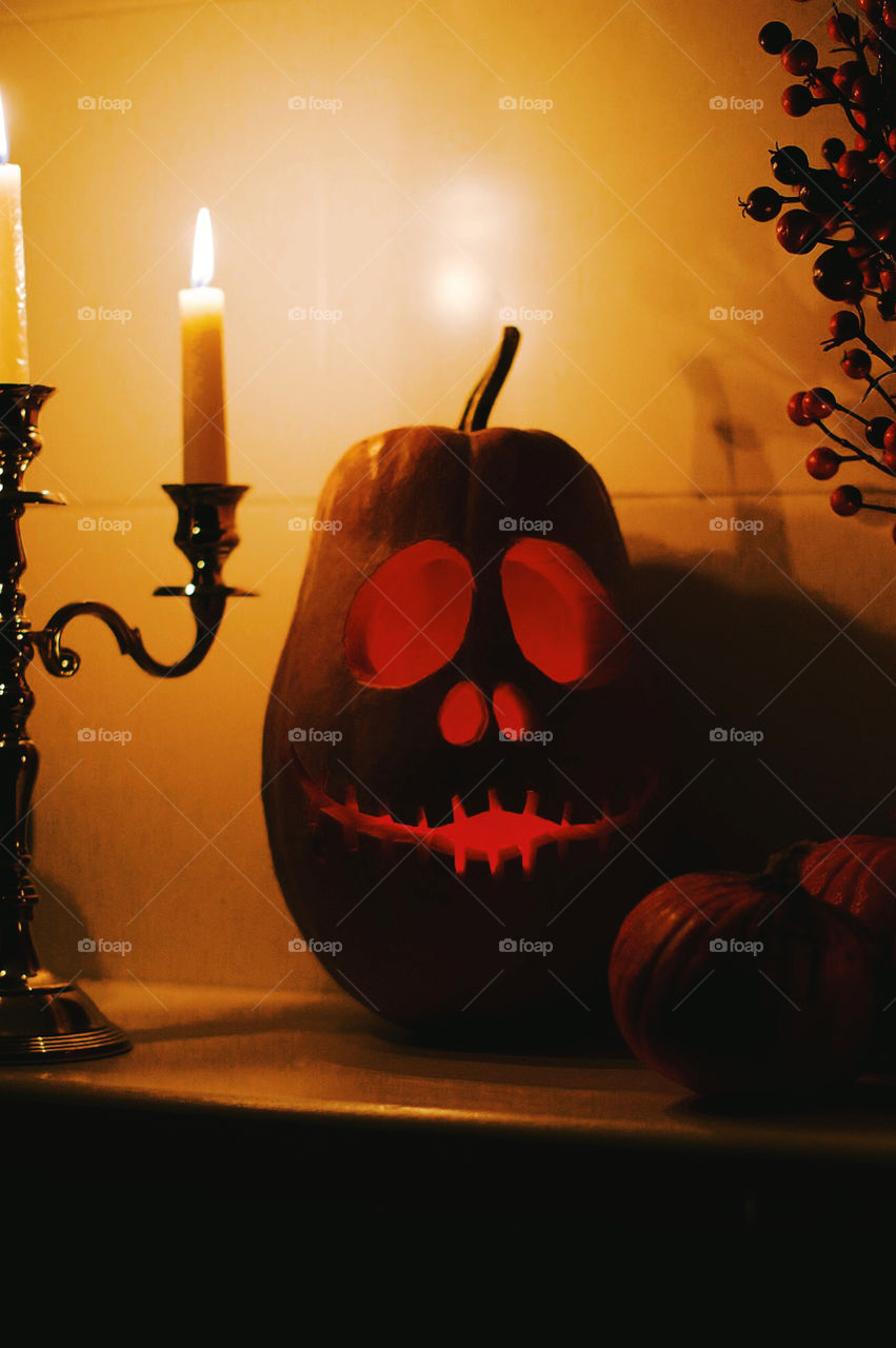 Halloween pumpkin and candle light