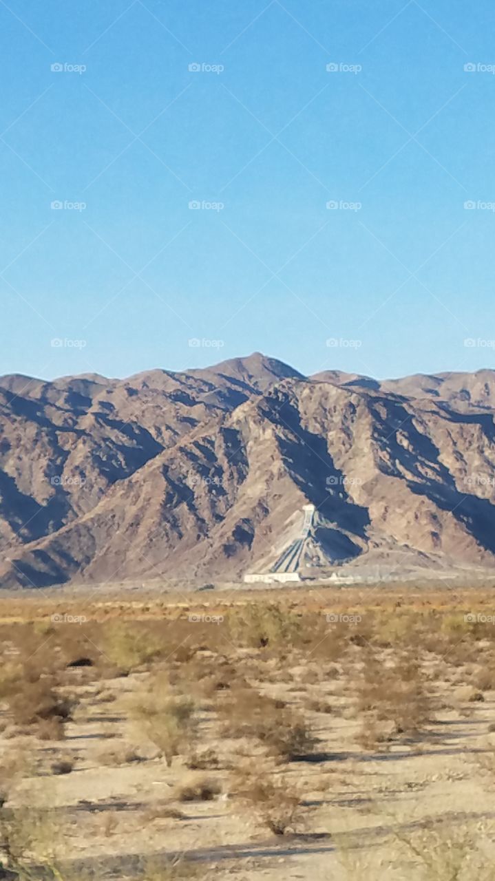 water pumps for irrigation canals coming through the mountain out in California