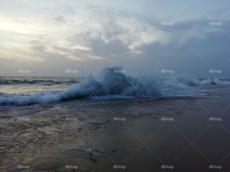 Sea water splashing on a evening