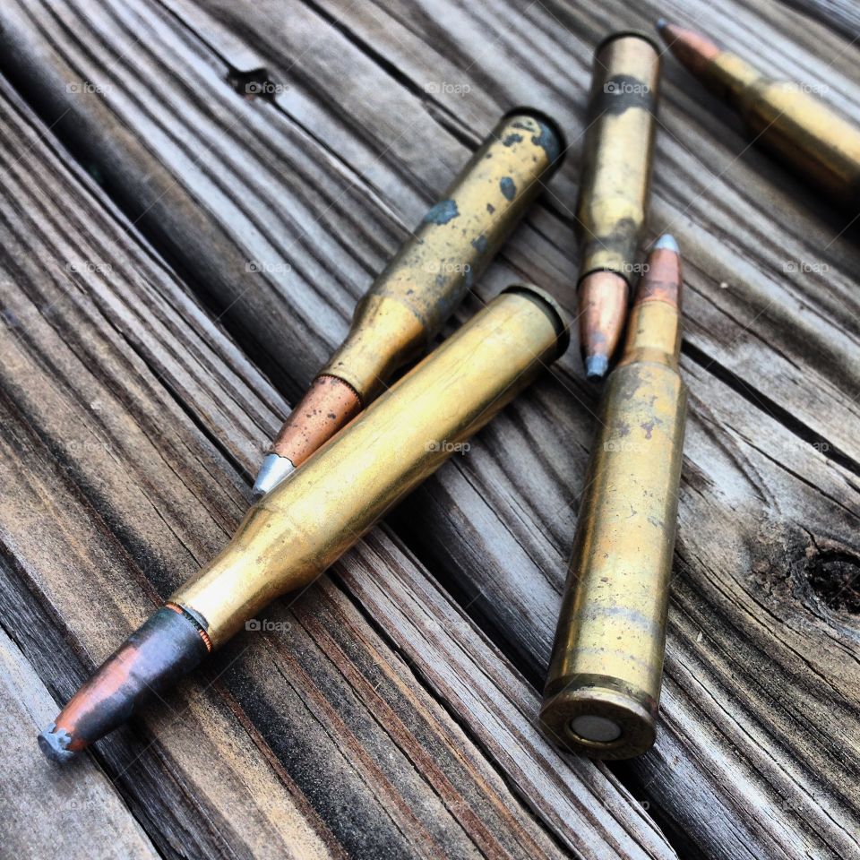 Bullets on distressed wood