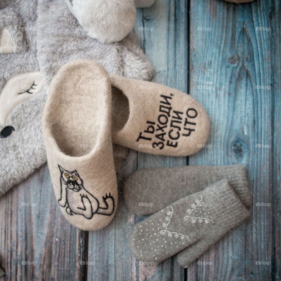 Wool sleepers and warm wear on wooden blue floor