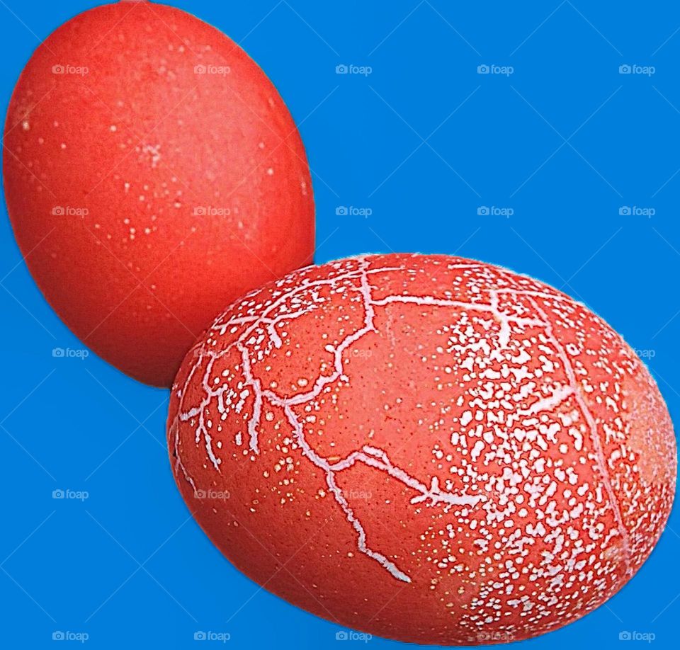 Blue with orange eggs.