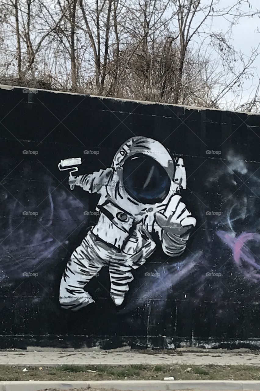 Astronauts.A space graffiti.Youngsters are worth it.