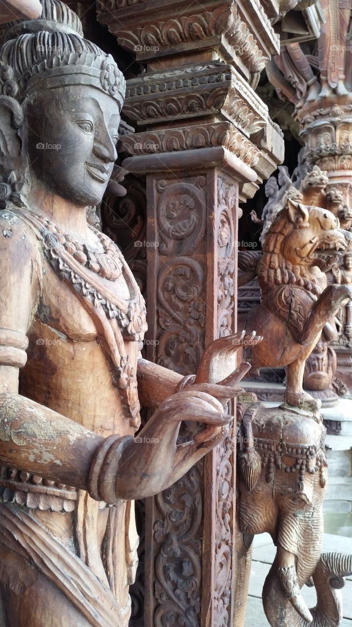 Sanctuary of truth statue.   Pattaya Thailand 