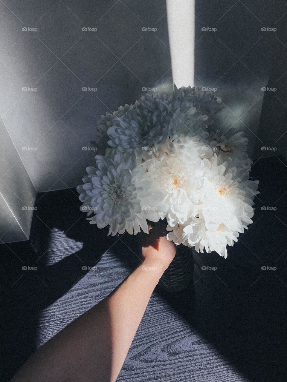 White beautiful flowers in vase at home