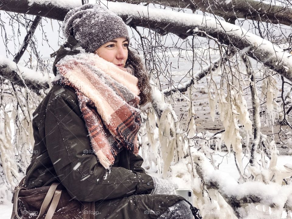 Young woman with scarf in winter