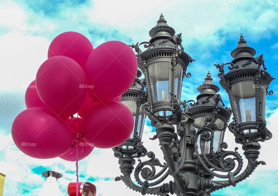 Pink balloons and old street light in Frankfurt, Germany 