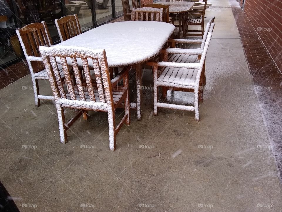 lonely furniture in the snow storm
