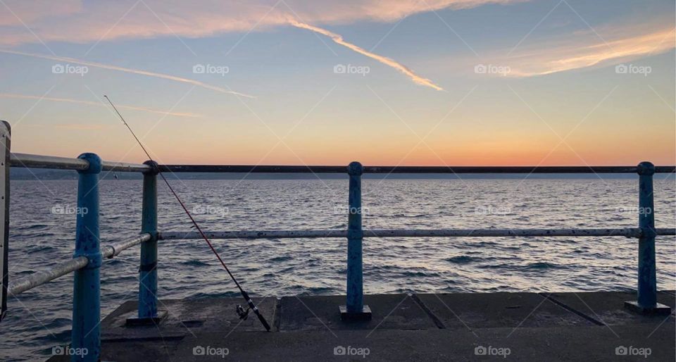 SUNRISE OVER WEYMOUTH HARBOUR EARLY MORNING